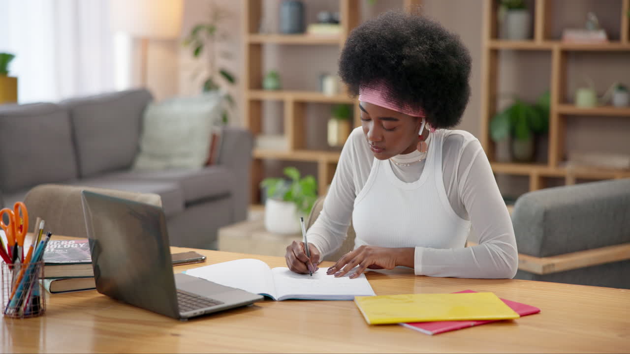 Young woman studying at home