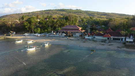 traditional balinese hindu culture and building in hidden beach in nusa penida, bali indonesia