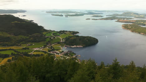 Scenic-drone-view-over-Lauvåsen-mountain-of-Fister-village,-Hjelmeland,-Norway