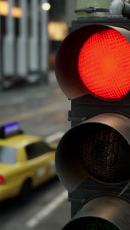 a red traffic light in a city