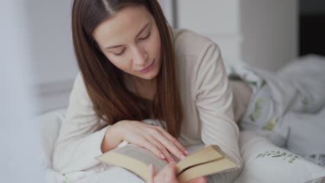 woman reading in bed