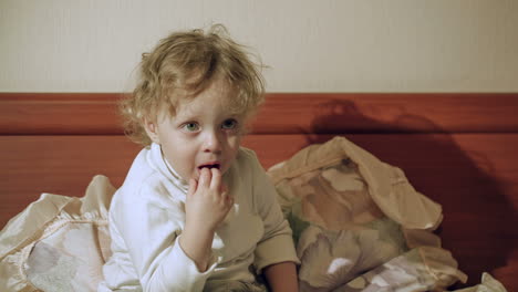 Cute-curly-boy-watching-TV