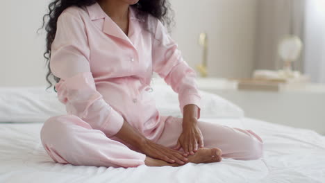 pregnant woman relaxing in bed
