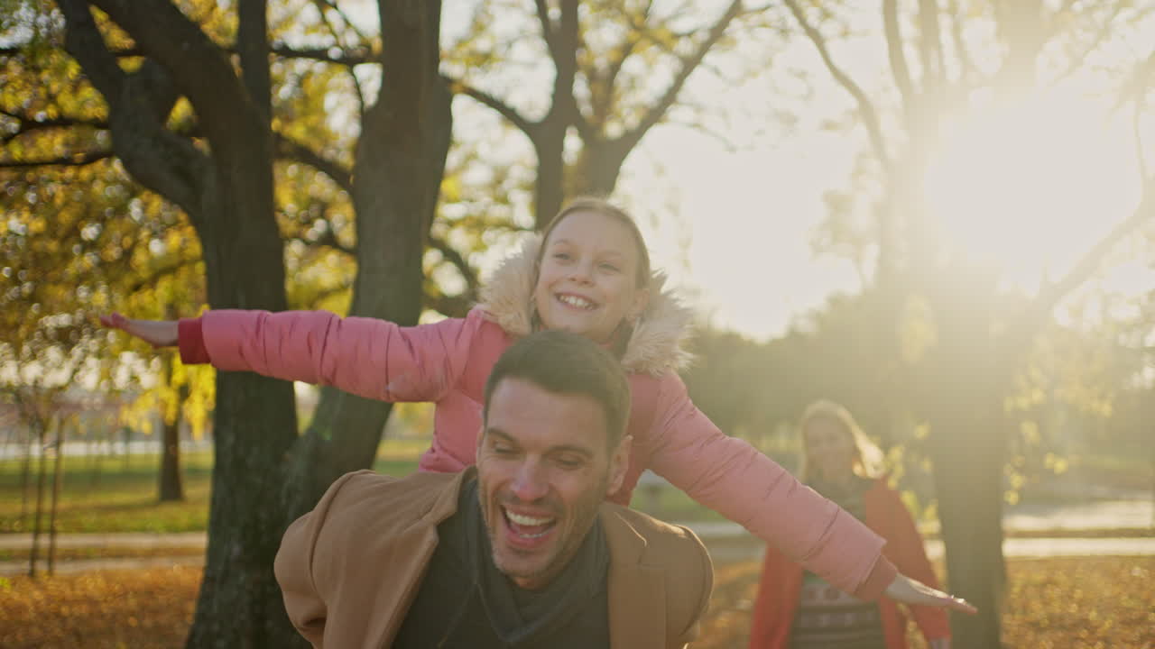 Family fun in the autumn park