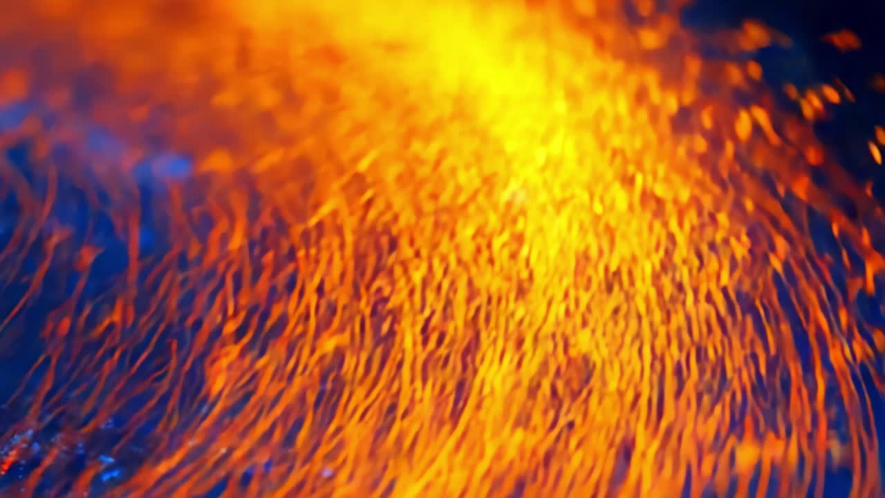 Cascading Sparks: An Enchanting Display of Glowing Embers and Vibrant Flames Against a Dark Background Capturing the Dynamic Movement of Fire's Energy and Beauty