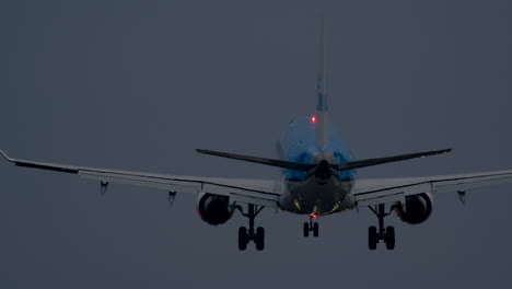 airplane landing at dusk