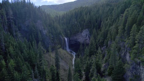 waterfall on sunny day approach far