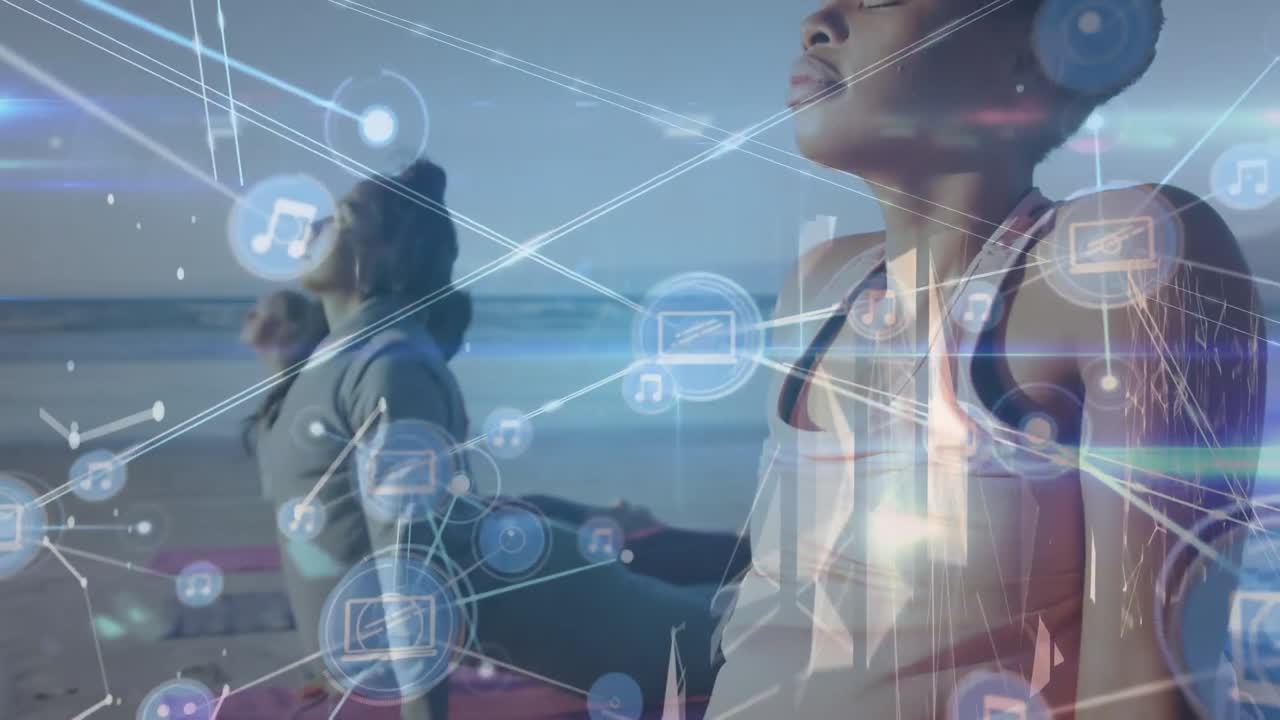 Animation of laptop, music icon network lines connecting dots, multiracial women excising at beach