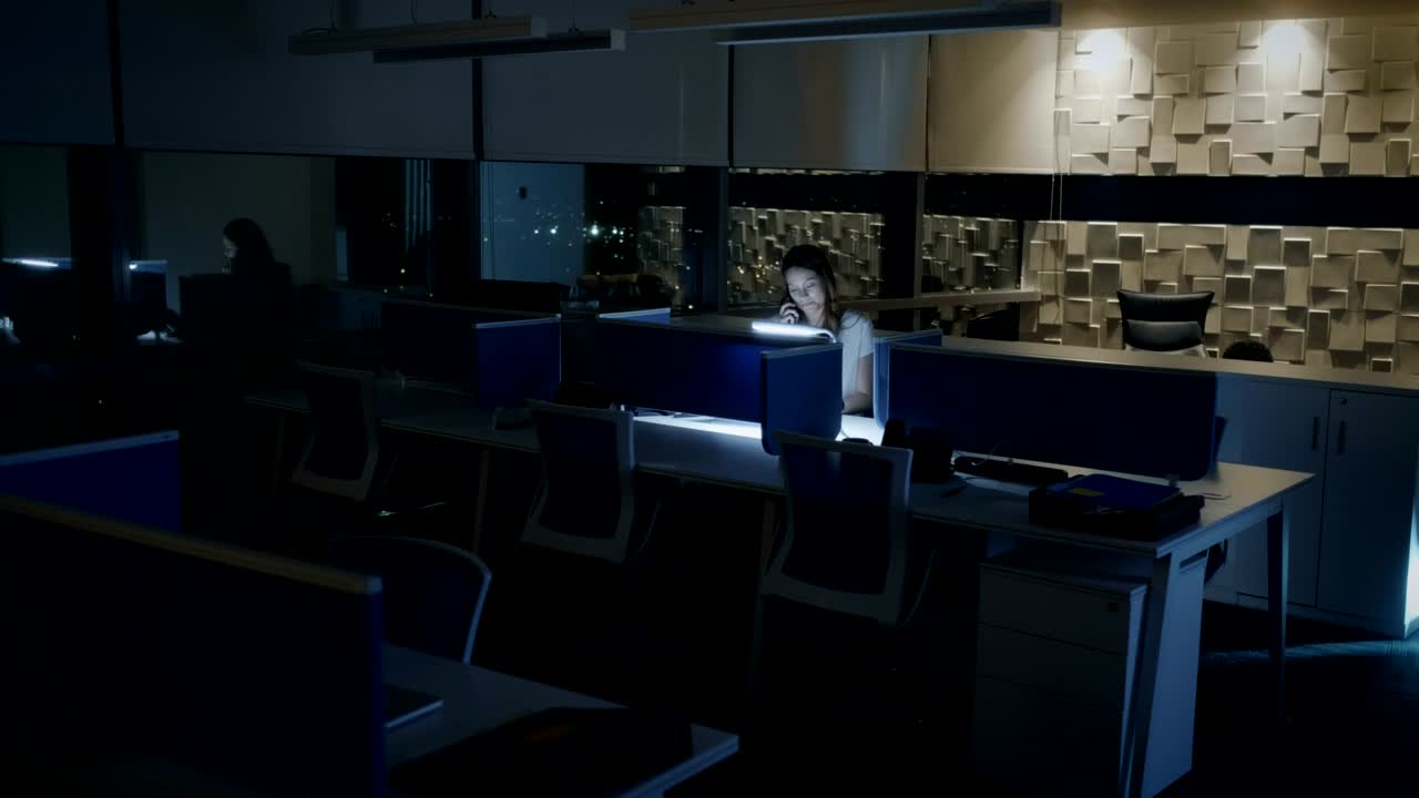 Businesswoman Business Woman Speaking On Mobile Telephone Late At Night