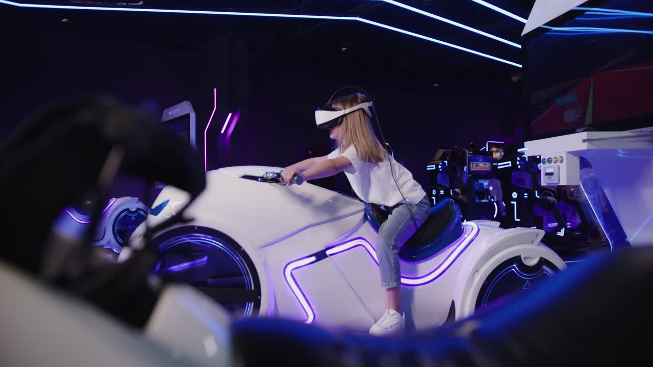 Teenager experiences virtual reality motorcycle simulator at an arcade