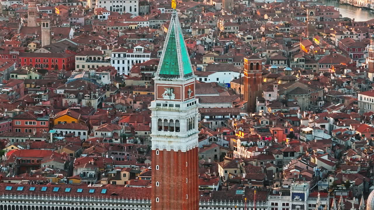 Aerial drone view of St Mark's Campanile with Venice, Italy on the background, on a sunny day
