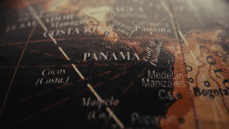 close-up of panama on a vintage world globe