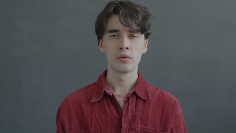 young man with surprised expression