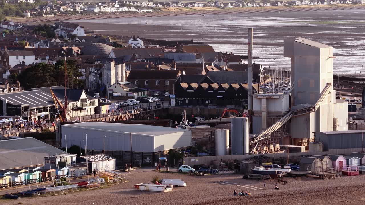 Industrial plant near beach in Whitstable, UK. Urban and coastal setting
