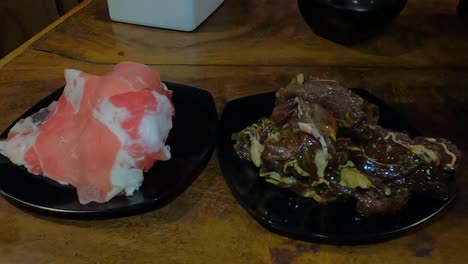 different types of raw meat prepared for cooking in korean restaurant,close up