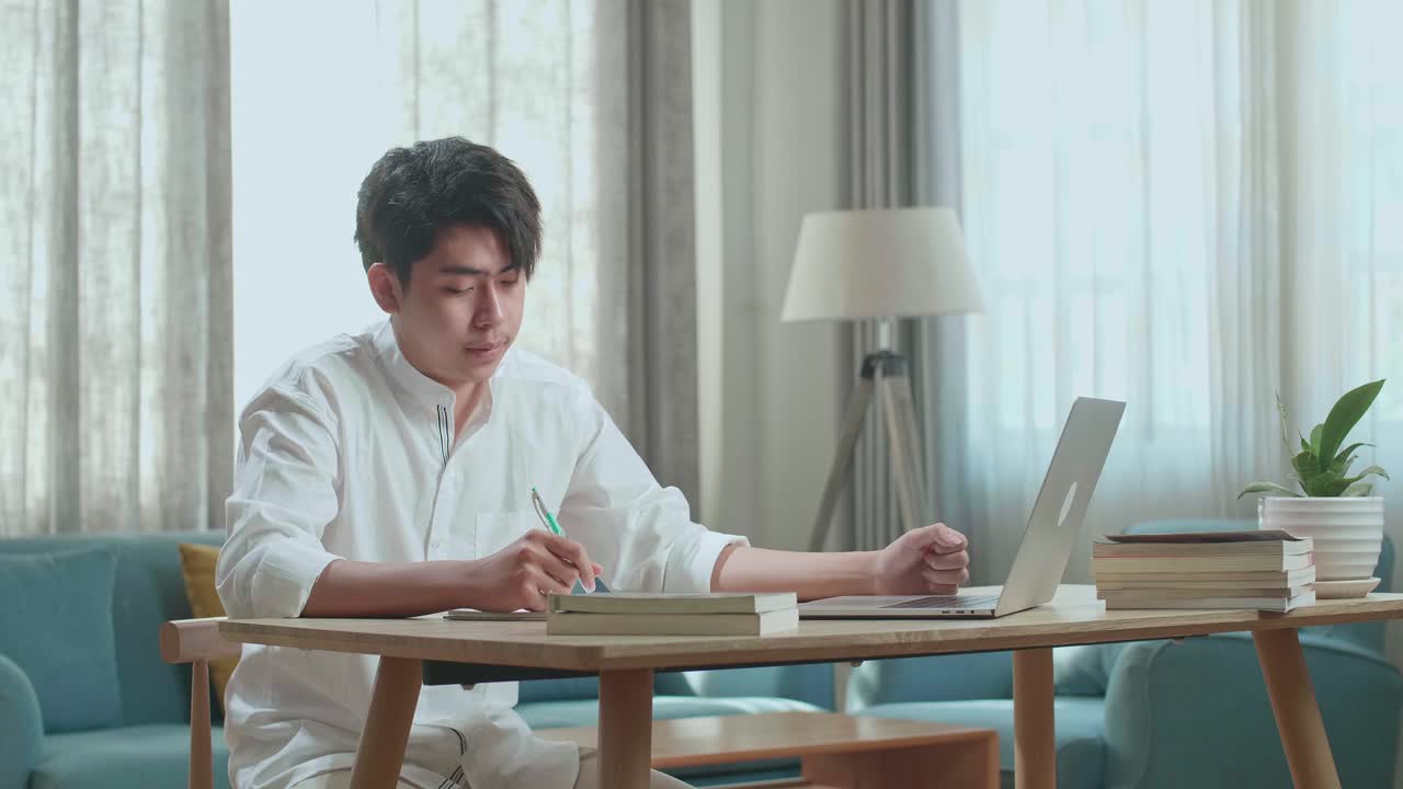 Student studying from home; studying and sleeping