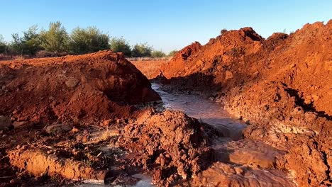 broken dam wall, compromising the structure of the wall, leading to erosion and destruction - slow motion