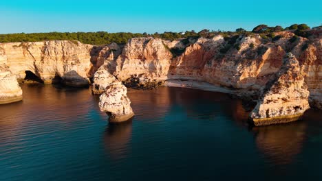 stunning aerial view of coastal cliffs and serene waters in portugal