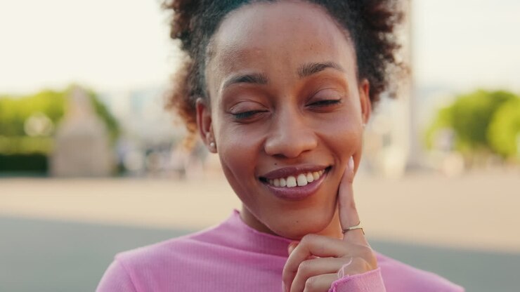 Smiling Young Woman in Pink Turtleneck
