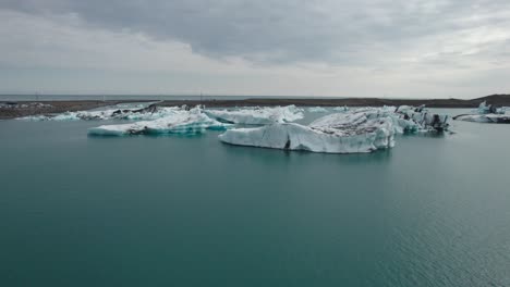 drone shot of the yokulsarlon glacier lake in iceland 3