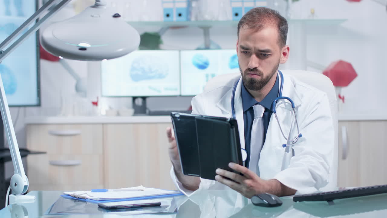 Doctor working with tablet in modern office