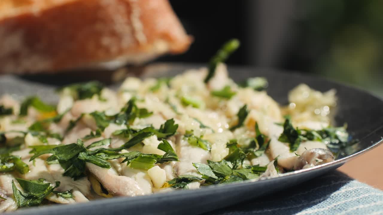 Fresh Sea sardines and Anchovy Fish and Mullus On Display On Ice On Market Store Shop. Seafood Fish Background, close up stand of small salty white fish.