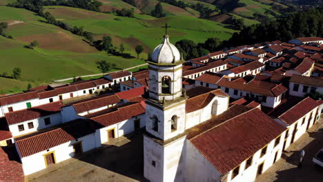 historic church bell tower in a rural landscape