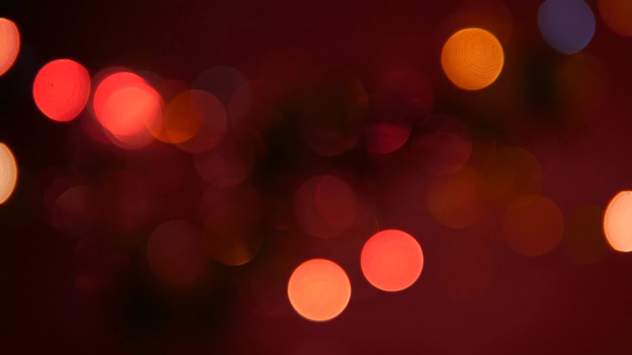Abstraction of festive lights flickering,bokeh colorful New Year lights festive.