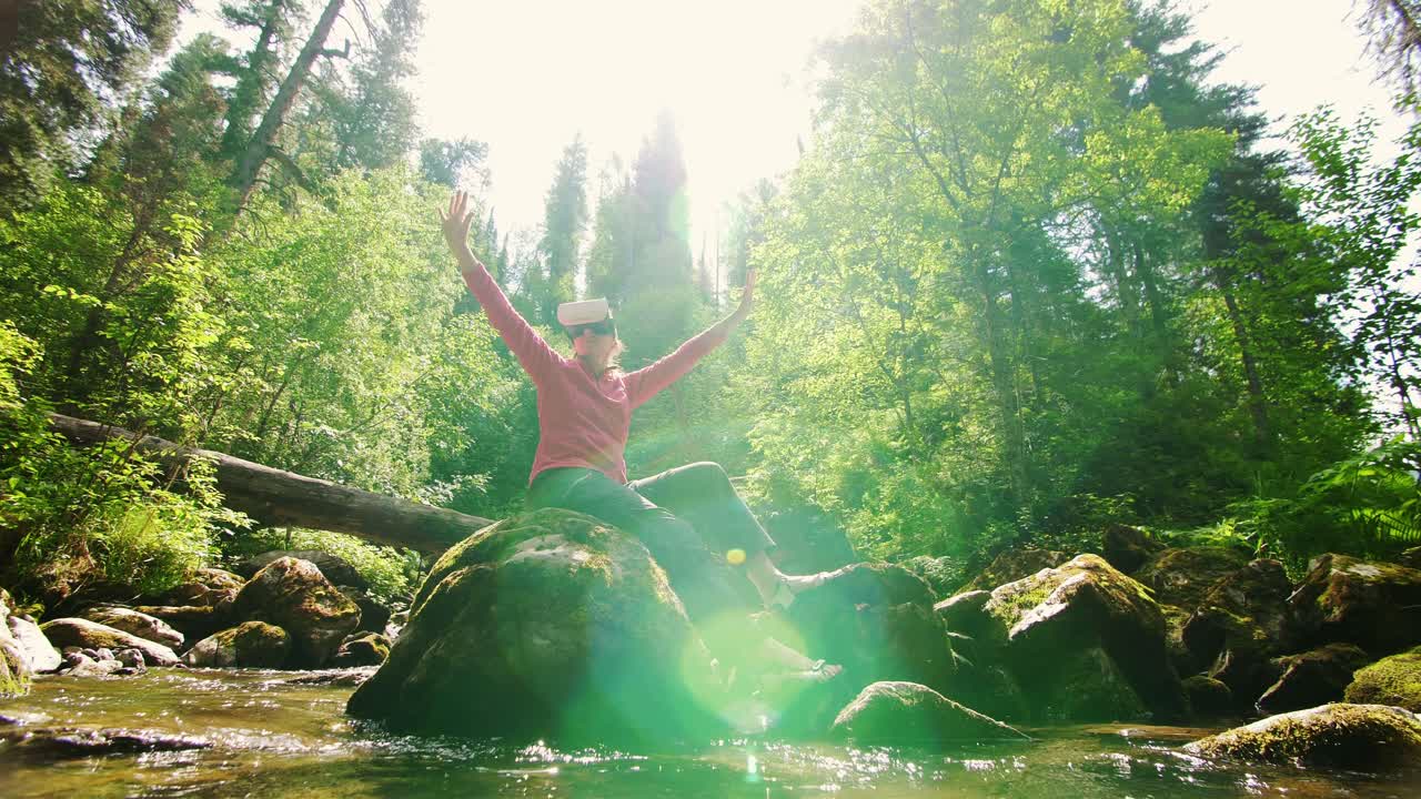 Woman enjoying virtual reality experience in a forest by a river