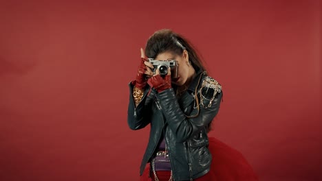 woman with vintage camera in 80's style