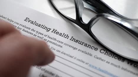 finger tapping on evaluation health insurance