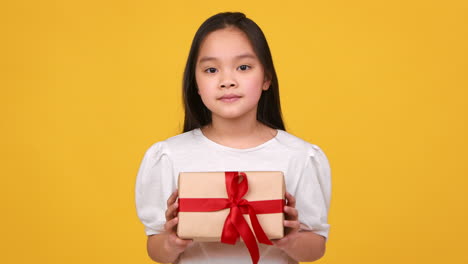 girl holding a gift