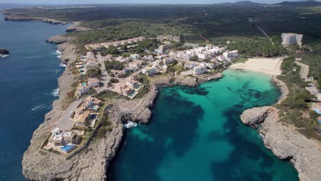 Aerial-drone-shot-of-the-shore-of-Cala-Millor,-Mallorca,-Balears-Islands,-Spain