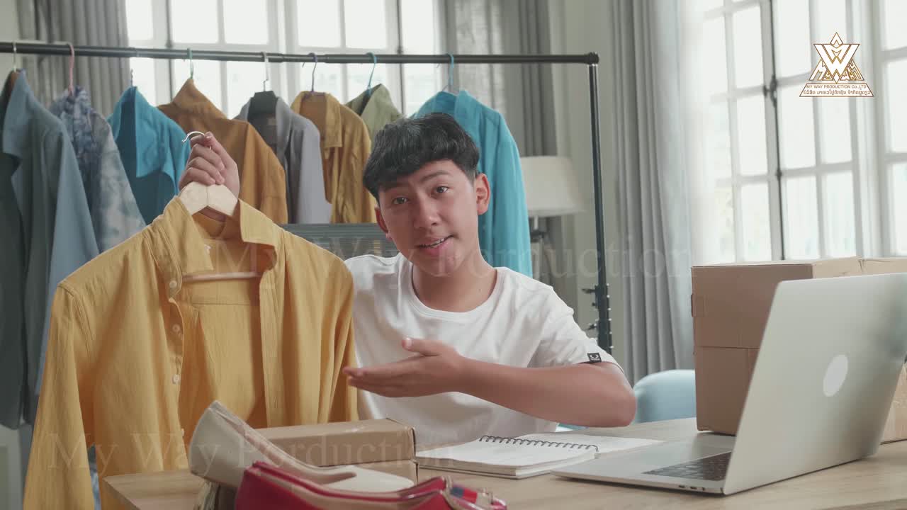 Man reviewing clothing items