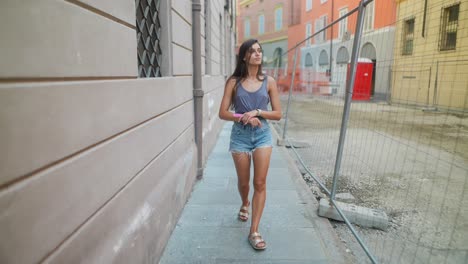 woman walking in a european city street