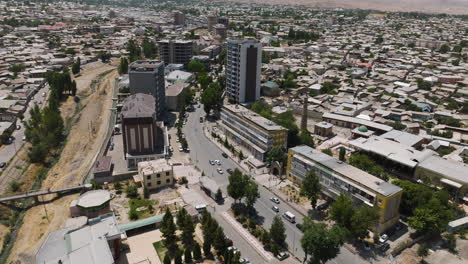 flying above the city of istaravshan in sughd province, tajikistan