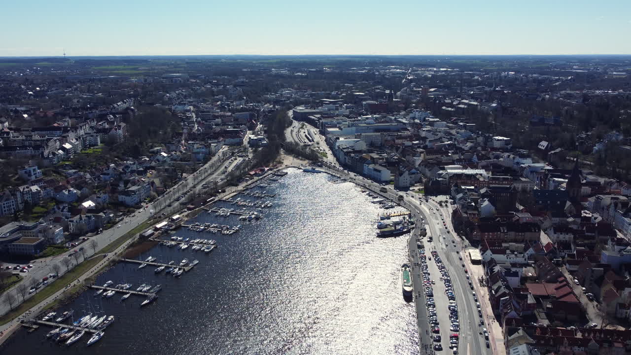 Aerial View of a European City with Marina and River