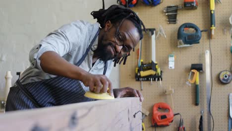 carpenter leveling wood with work tool 4k