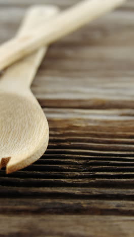 wooden spoon and fork on table