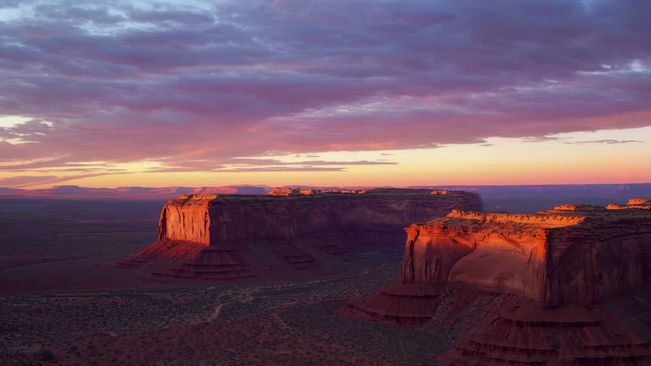 Vibrant Sunset Over Monument Valley Desert Landscape