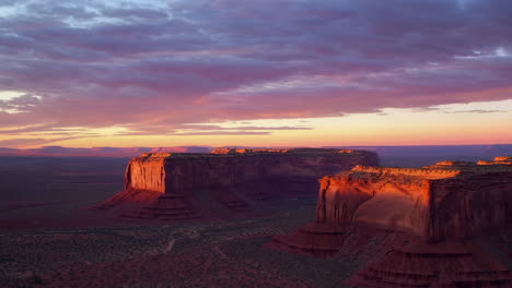 vibrant sunset over monument valley desert landscape