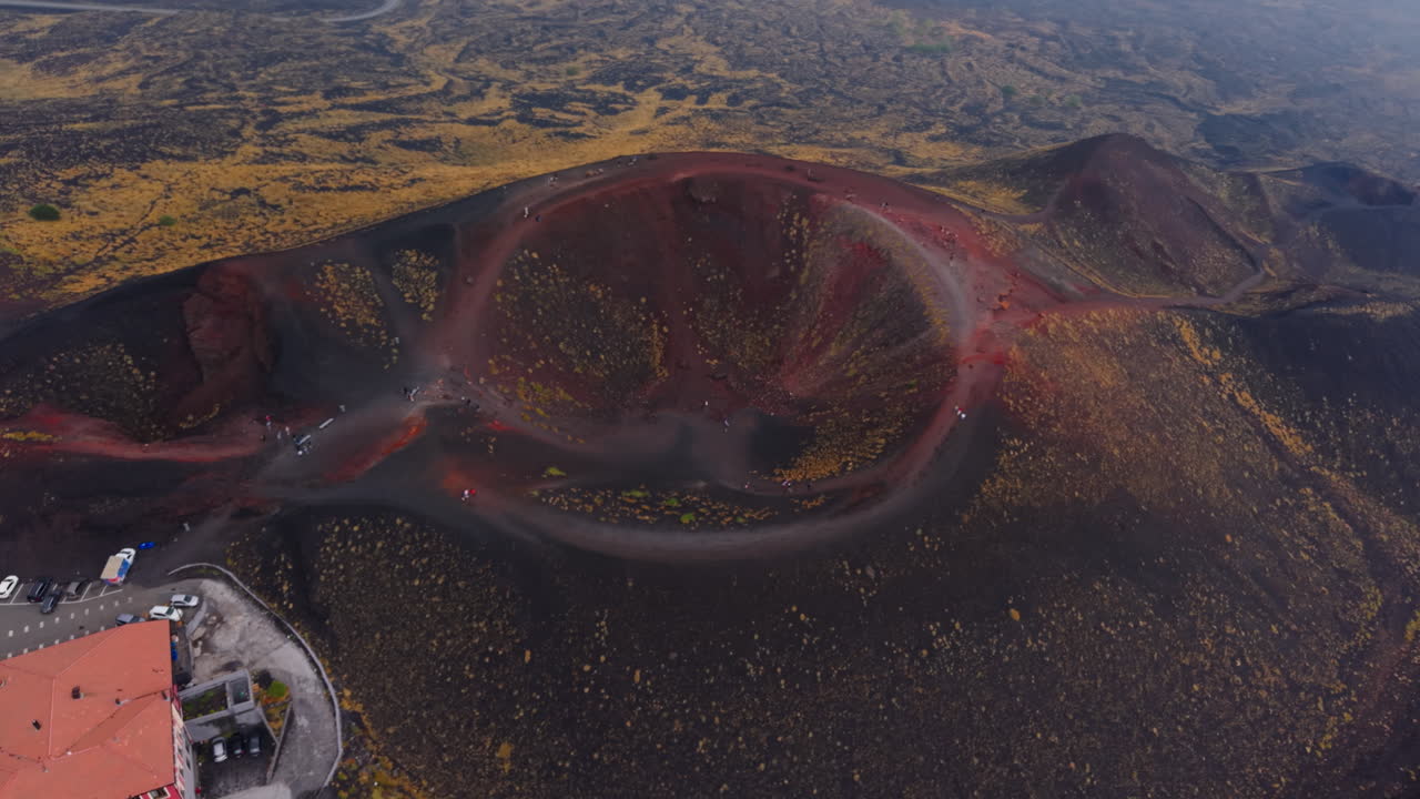 Drone view of Mt. Etna crater with volcanic terrain in Sicily