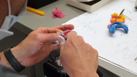 dental technician working on a dental skeletal prosthesis