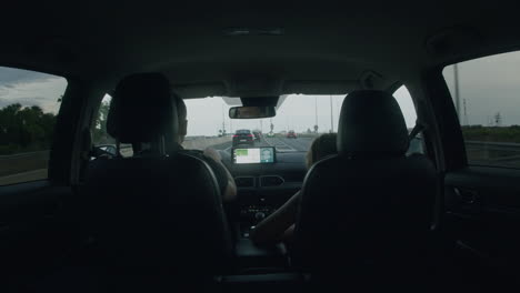 father and son are driving in a car timelapse