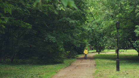 Woman-Walking-In-A-Beautiful-Park