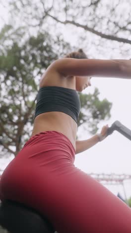 woman exercising outdoors in athletic wear