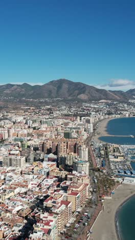 fuengirola: modern cityscape with mediterranean architecture and hills