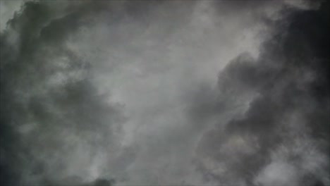 4k point of view, a thunderstorm inside dark a cumulonimbus cloud with a bolt of lightning