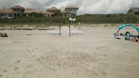 beach wedding venue awaiting guests emerald isle north carolina aerial tracking outwards