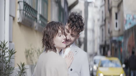 couple kissing in the city street